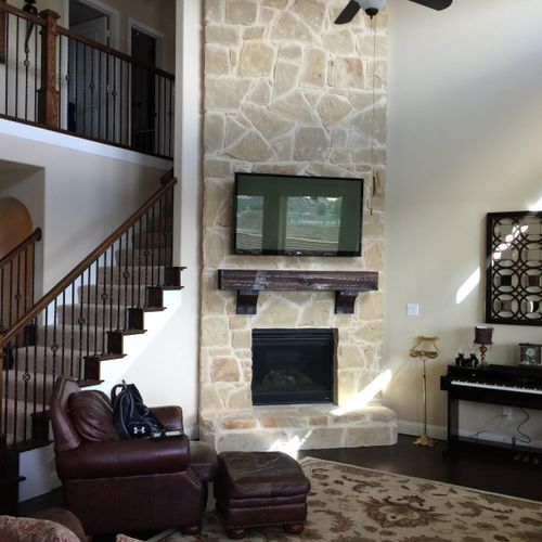 TV Over Stone Fireplace