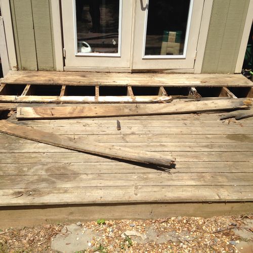 Taking up old deck, replacing with new.