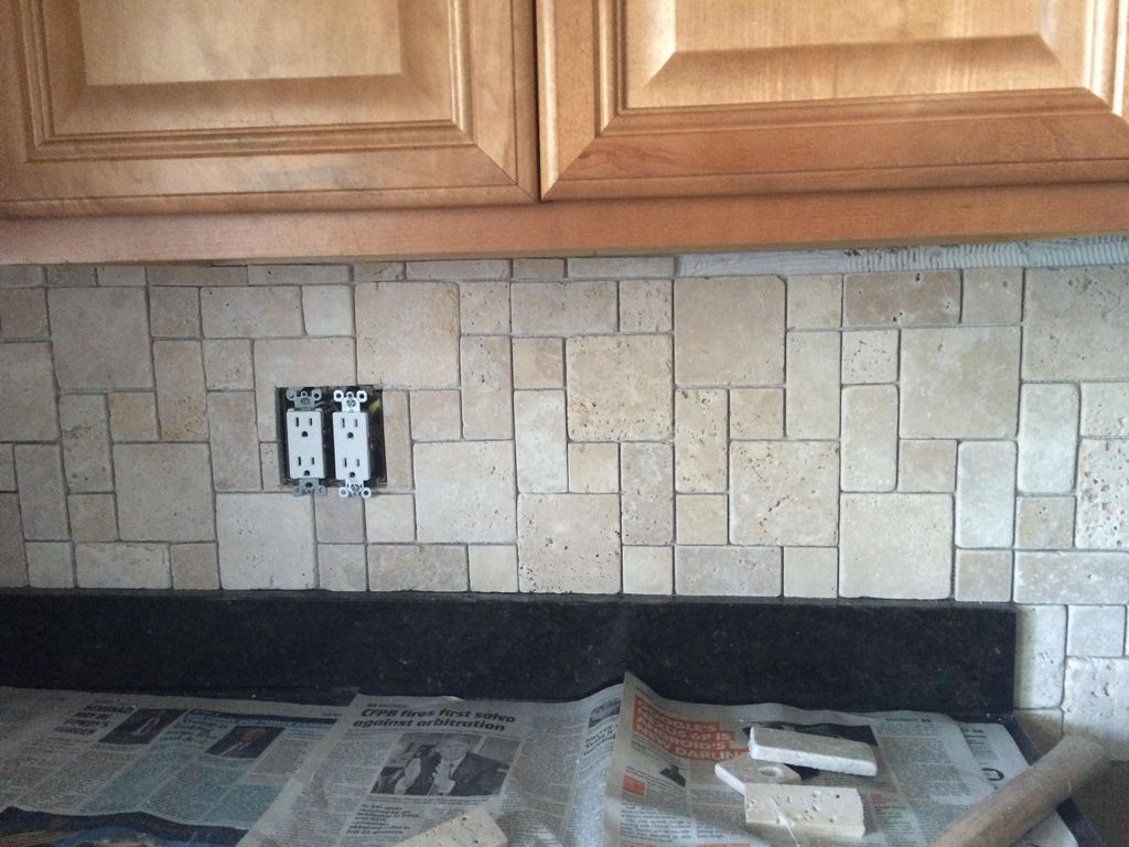 Travertine Romano backsplash in kitchen.