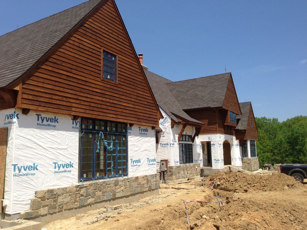 New construction cedar siding finished with Sikken