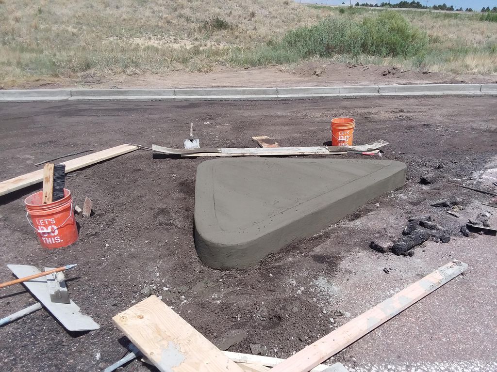 New curbing in parking lot.       www . genarl con