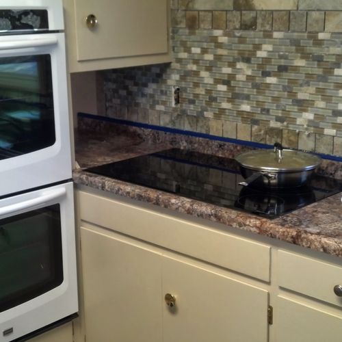 Kitchen tile and counter top.