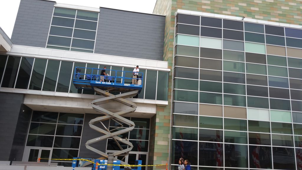 Cleaning the Austin Long Center's windows and conc