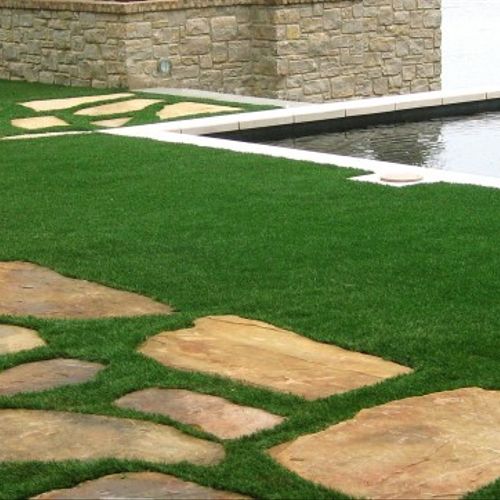 Synthetic Turf with Stone accents.