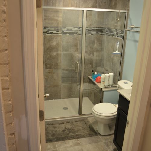 Soulard bathroom remodel.  Ceramic shower walls wi