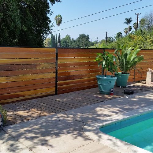 Built a custom wood and metal fence for a customer