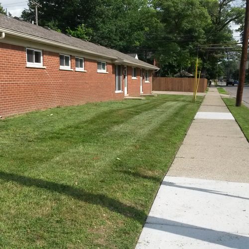 lawn cutting apartment complex