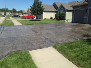 We pressure washed and sealed this colored stamped