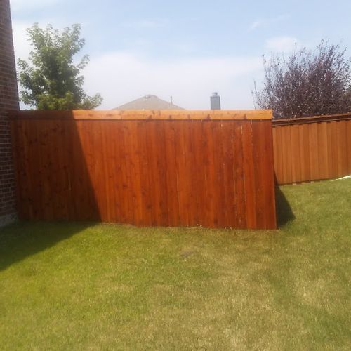 Here is a fence I stained a natural cedar tone.