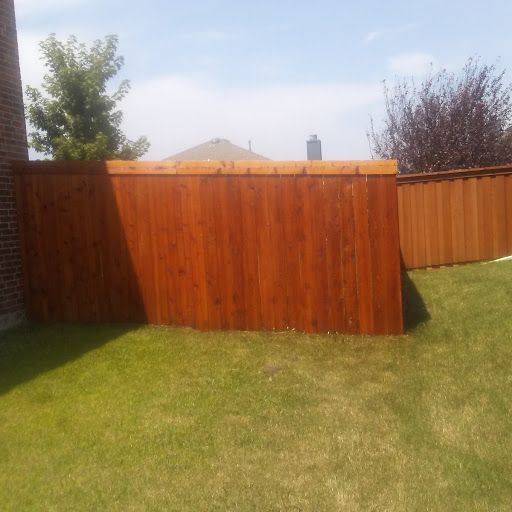 Here is a fence I stained a natural cedar tone.