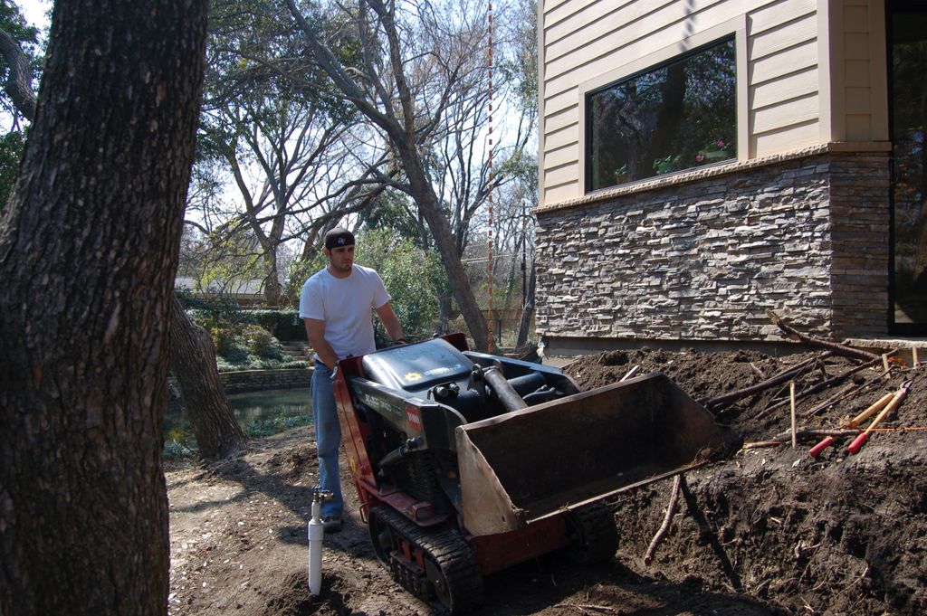prepping landscape for retaining wall