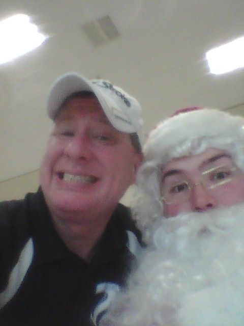 Helping Santa Pass out Gifts at the Shelter