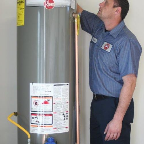 Master Plumber installing a new Water Heater