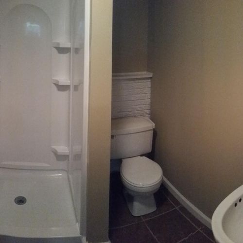 Shower, toilet, pedestal, flooring, trim