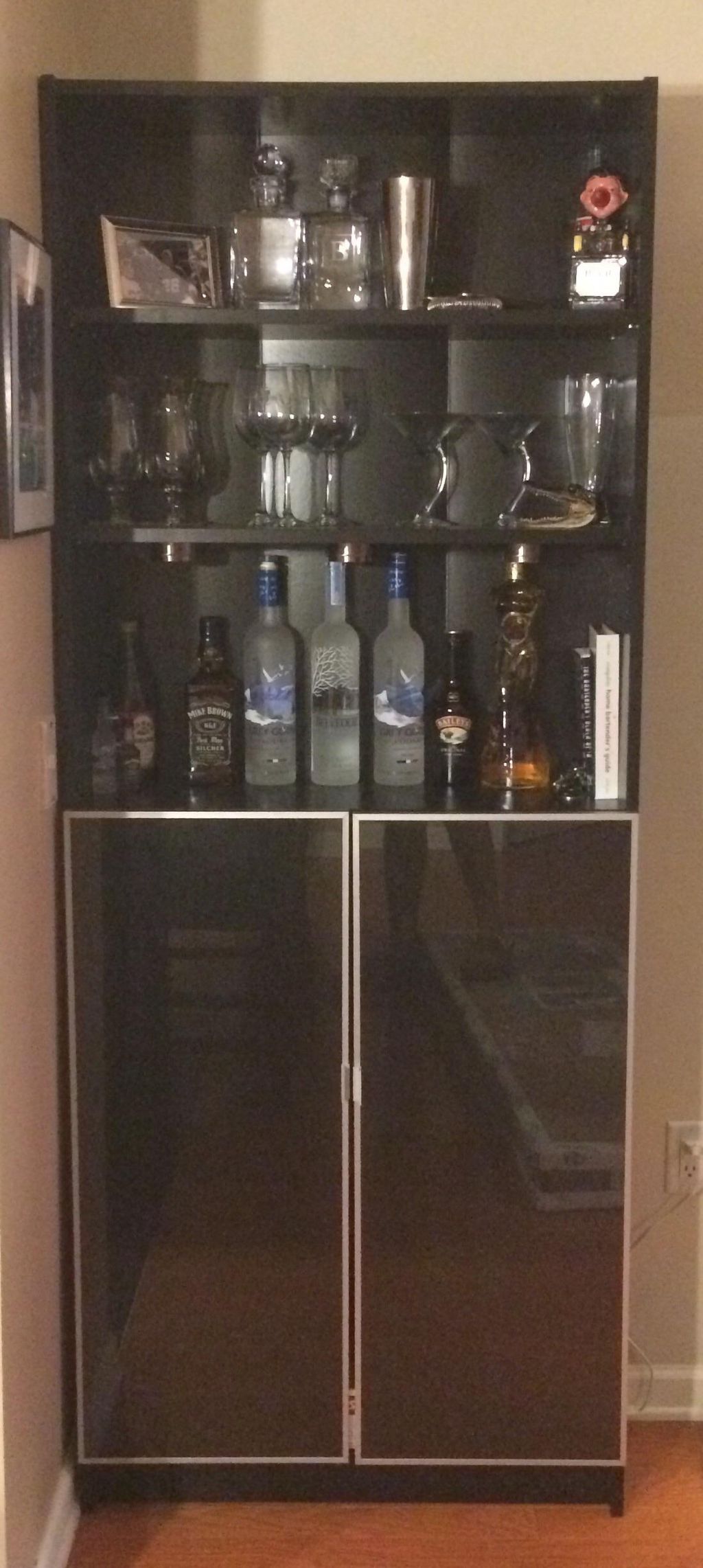 built CUSTOM Bar with glass doors using an IKEA BI