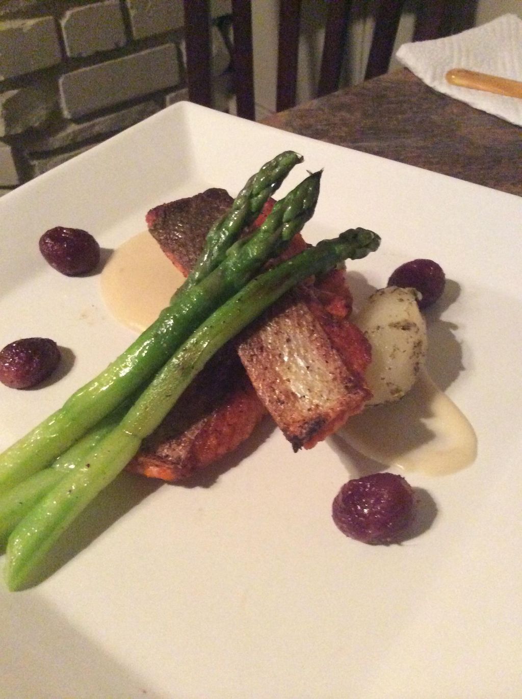 Salmon asparagus grapes and tourne potato