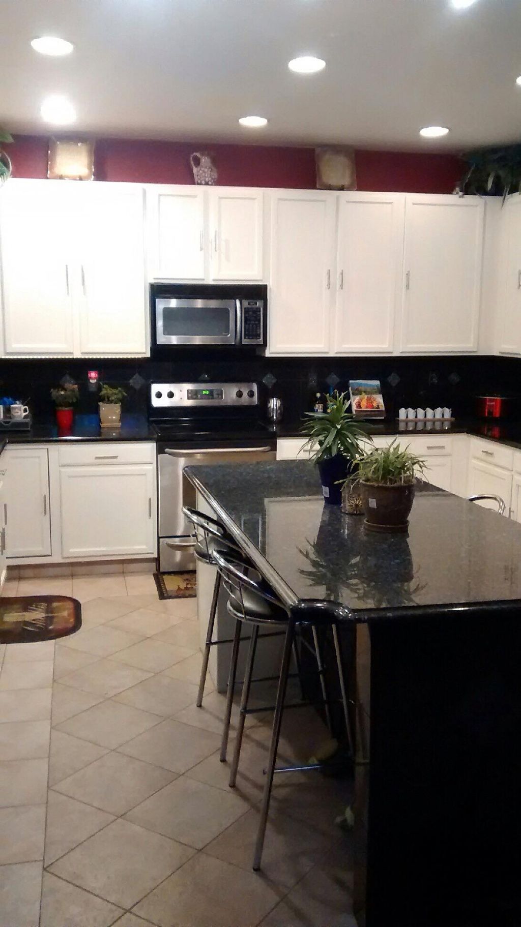 Cabinet re-surface/caulked and coated 3 times