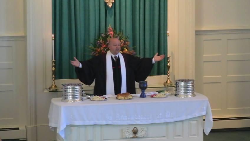 Serving communion at a church wedding