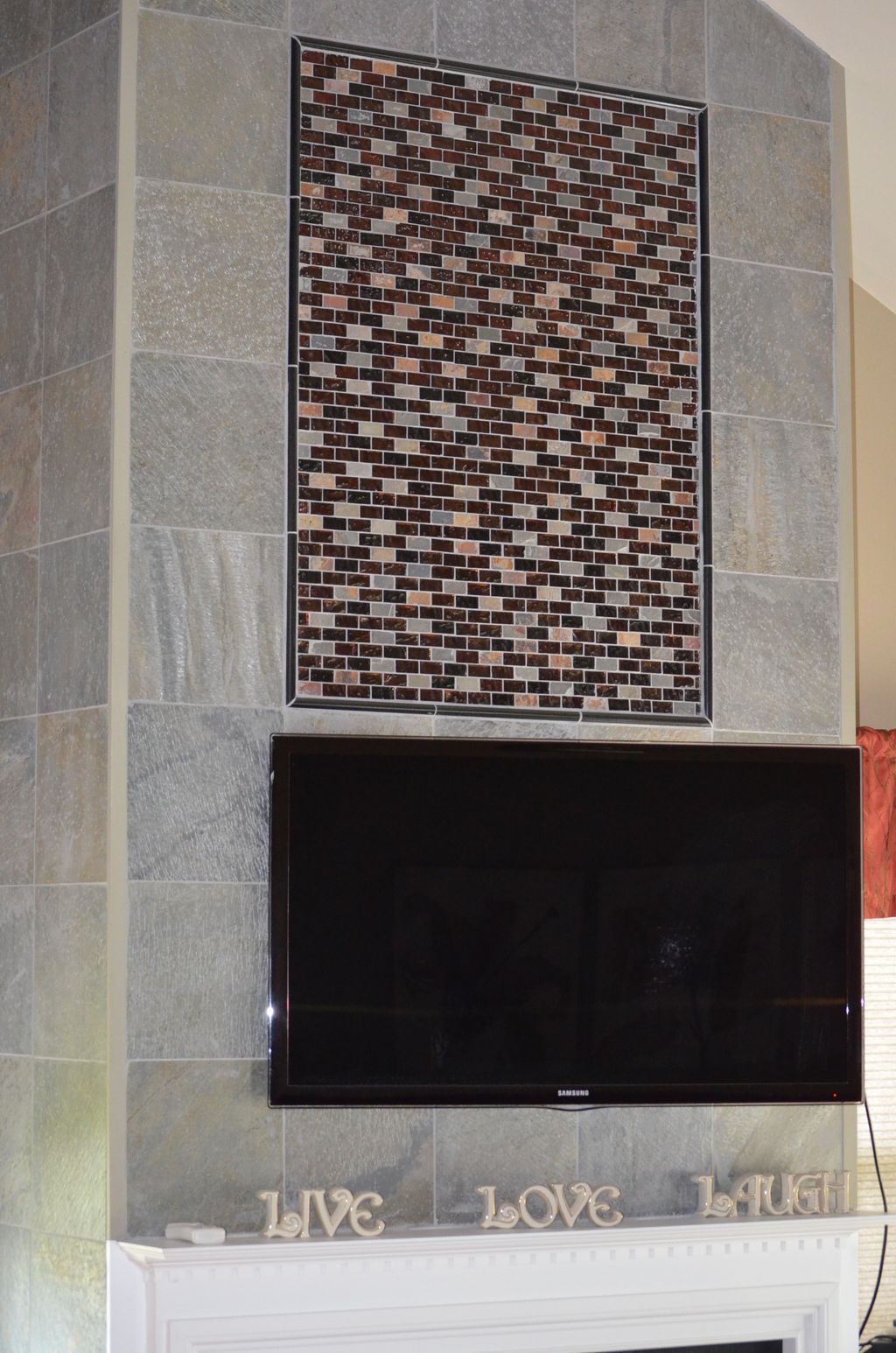 Tile installed on fireplace walls
