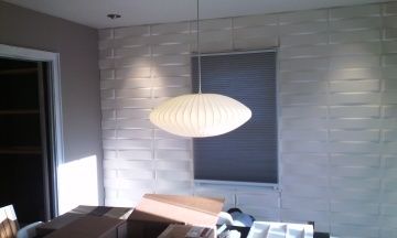 After dining room accent wall paneling was install