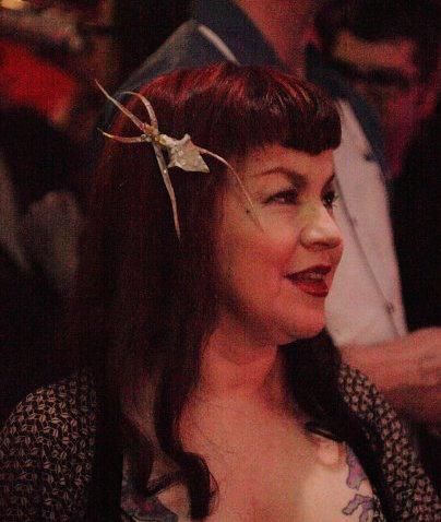 Hi! Here I am at a wedding looking on as the happy