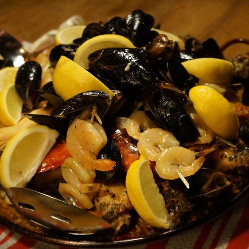 Traditional Spanish Paella, made for you over a ca
