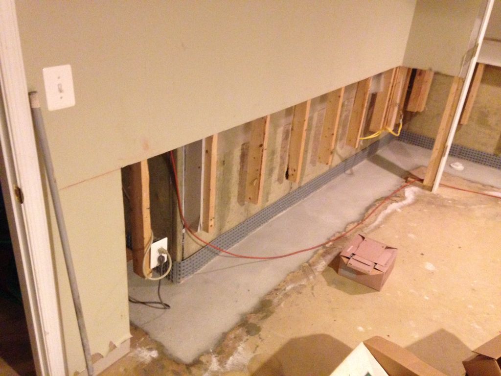 Finished waterproofed section of a basement