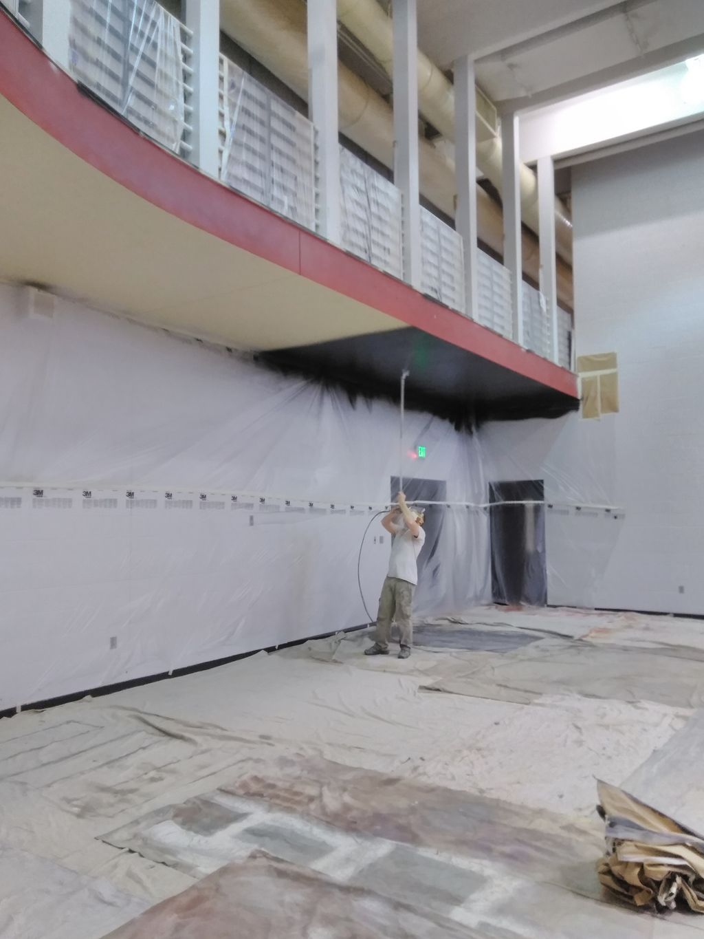 Spraying soffits with a little help from the exten