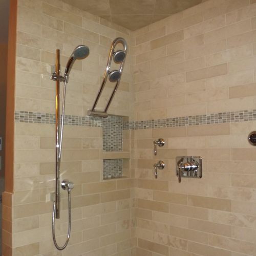 Remodeled shower with multiple adjustable shower h