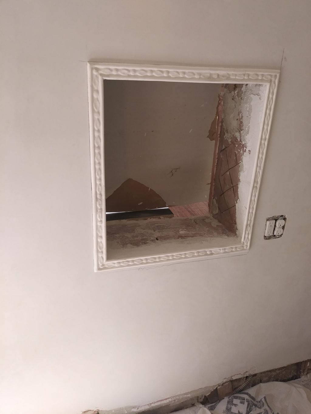 Plaster trim casts in kitchen repair.