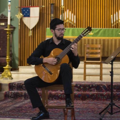 Performing classical guitar in Houston