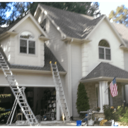 Painting exterior stucco- In Twin Lakes  
Wisconsi