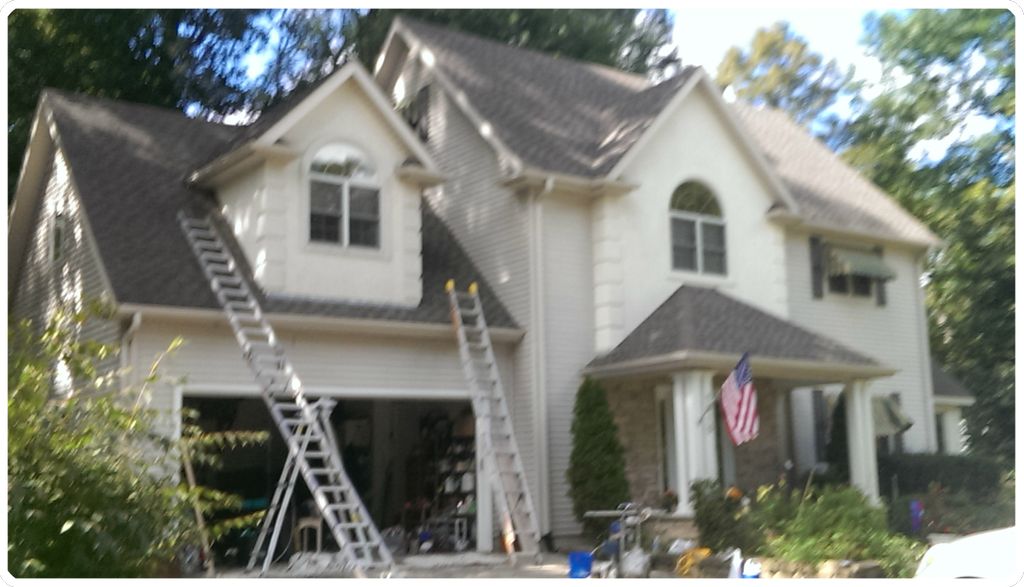 Painting exterior stucco- In Twin Lakes  
Wisconsi