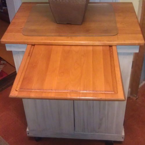 A cutting board cabinet we completely restored and