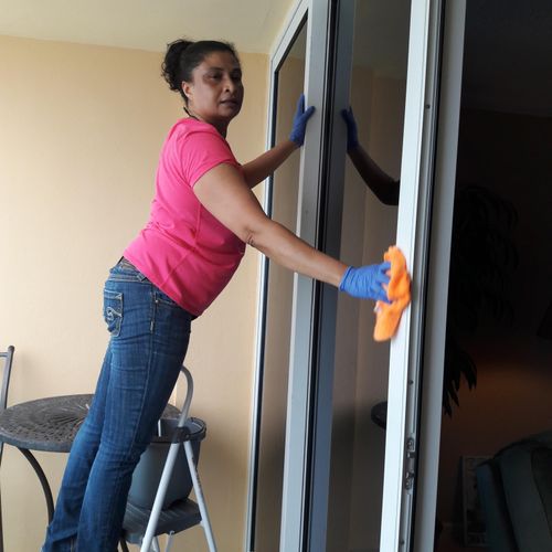 Cleaning sliding doors at a residence