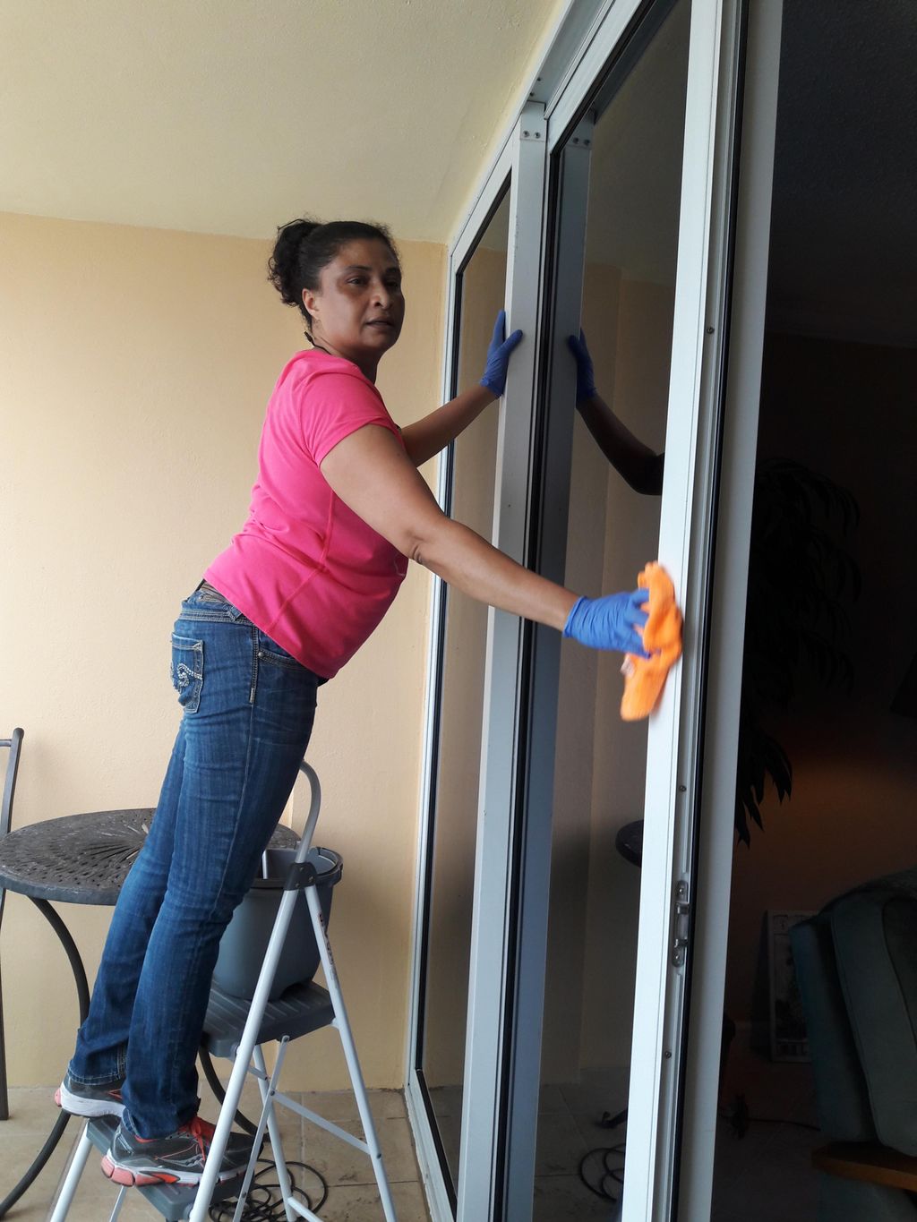 Cleaning sliding doors at a residence