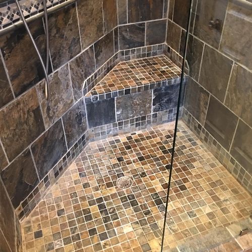 Shower with slate tile before cleaning