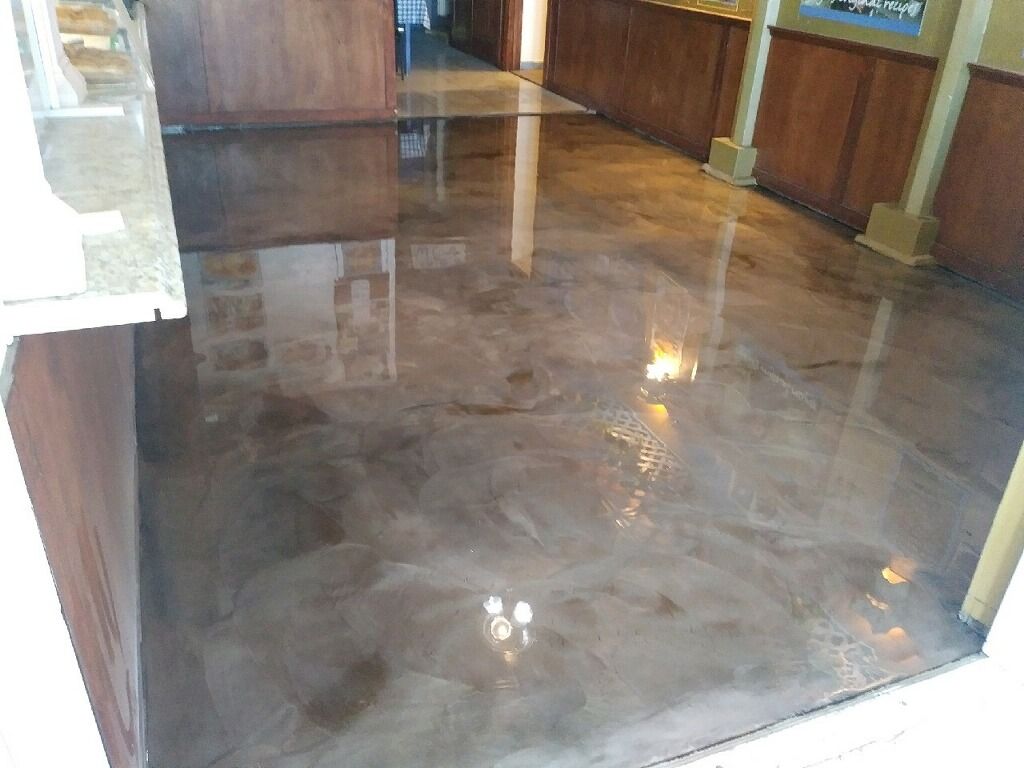 Wilderness & Coffee metallic epoxy floor. 
