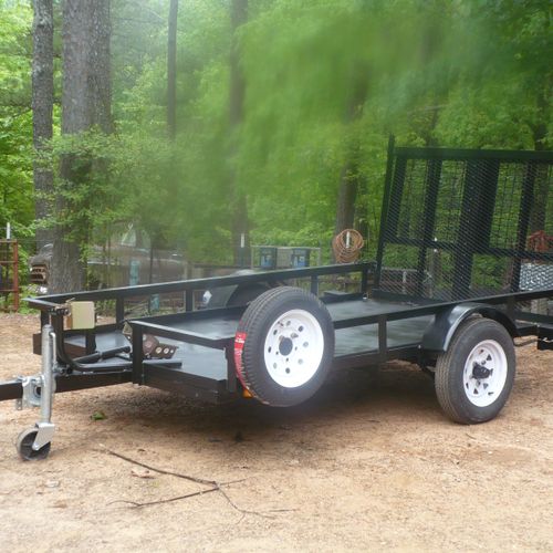 Fabricated motorcycle trailer with low height two 