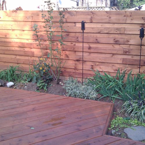 Stained cedar fence and Diagonal Deck