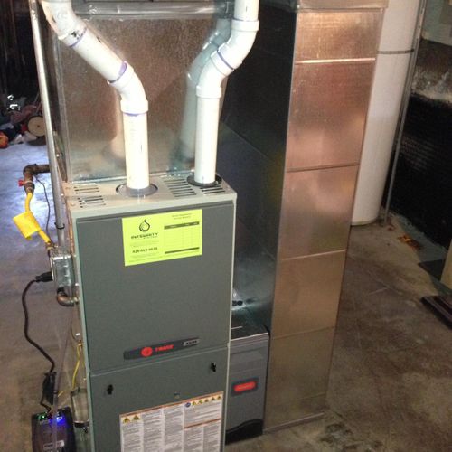 A new Trane high efficiency gas furnace and 4" med