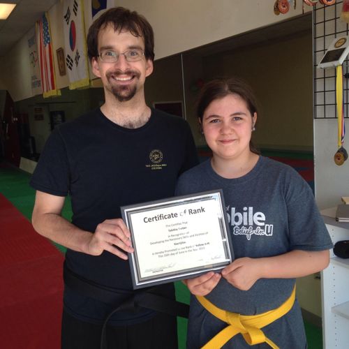 Tabitha earned her Level 1 Yellow Belt 2014