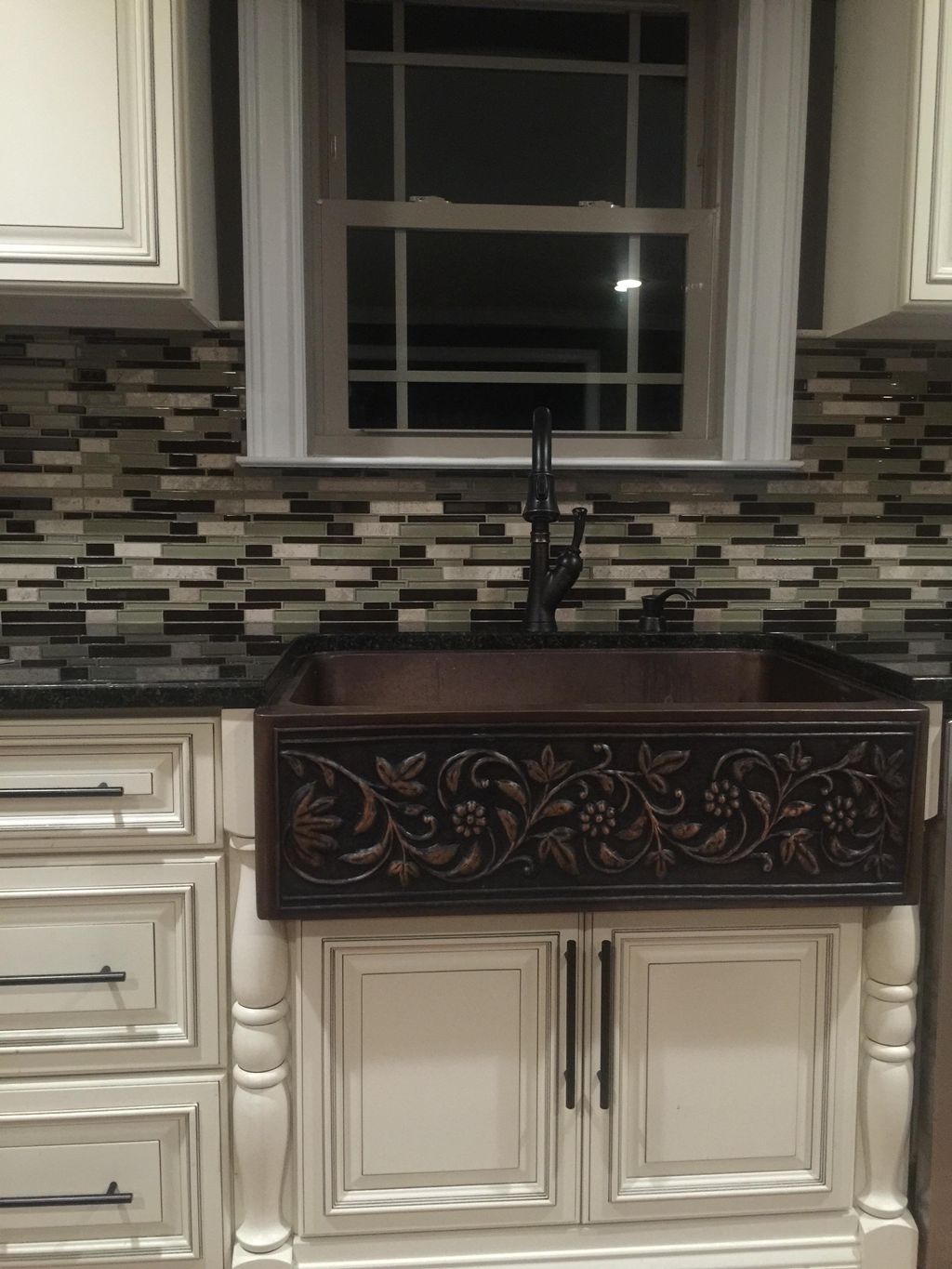Custom kitchen with copper sink