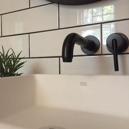 We love wall-mounted faucets that make a statement