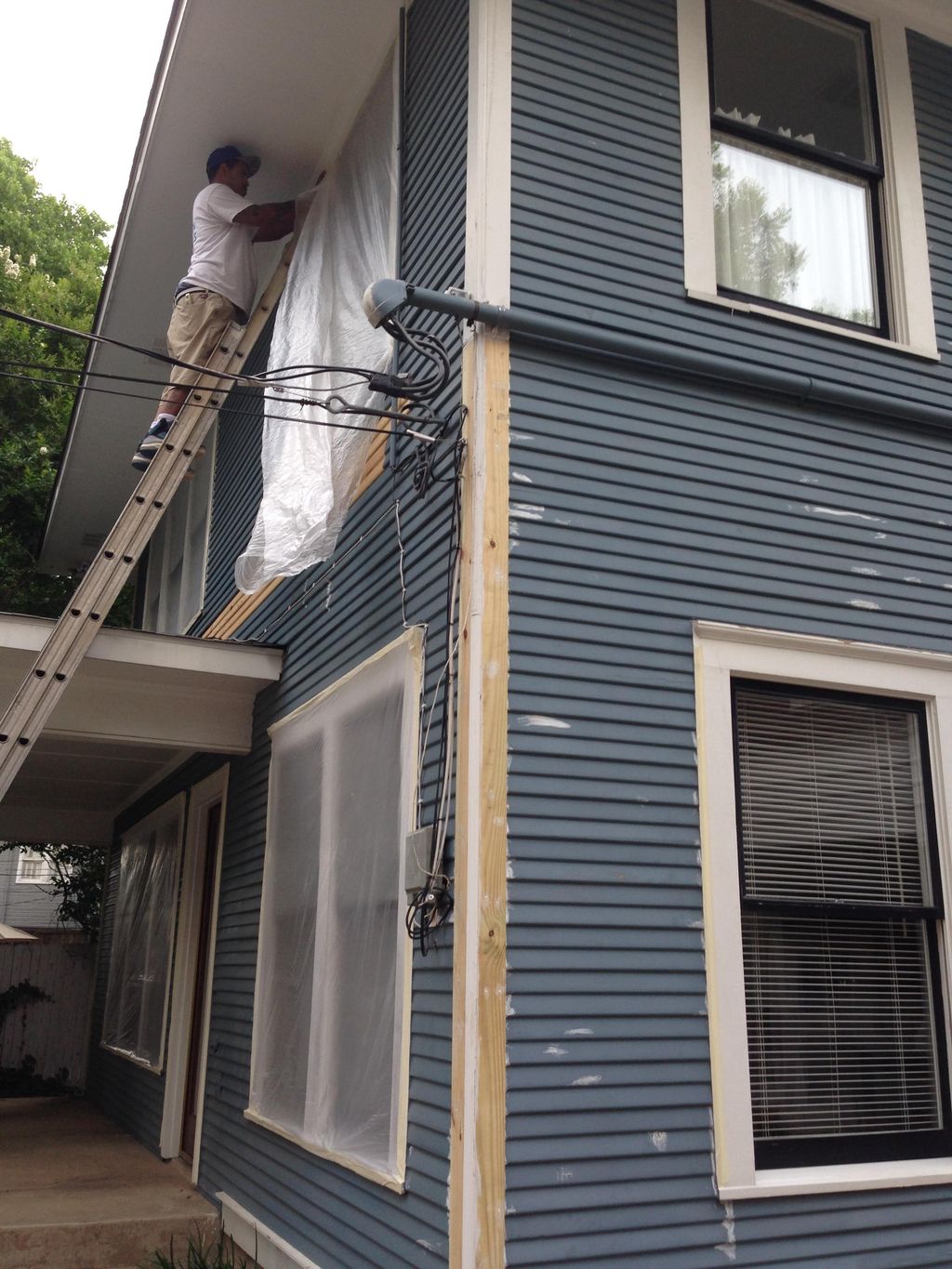 Exterior repaint with wood replacement. Heavy focu