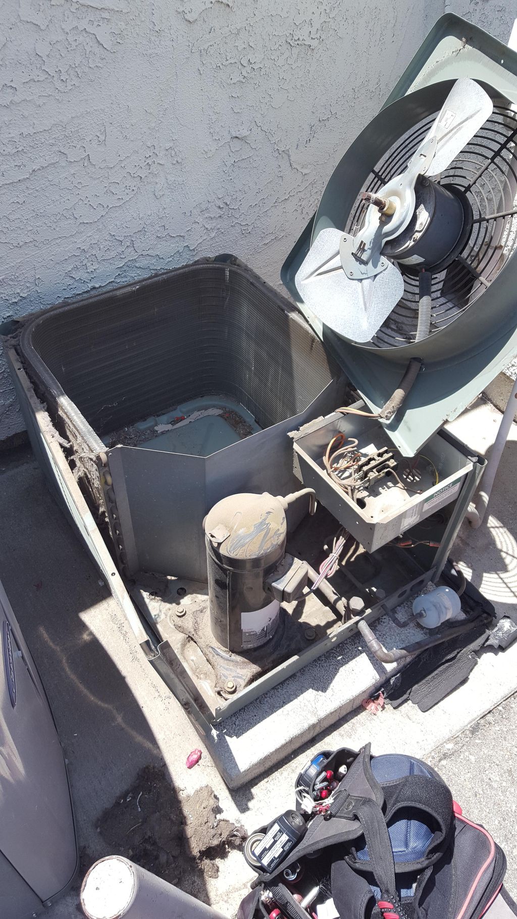 Air conditioning condenser coil cleaning. Covered 