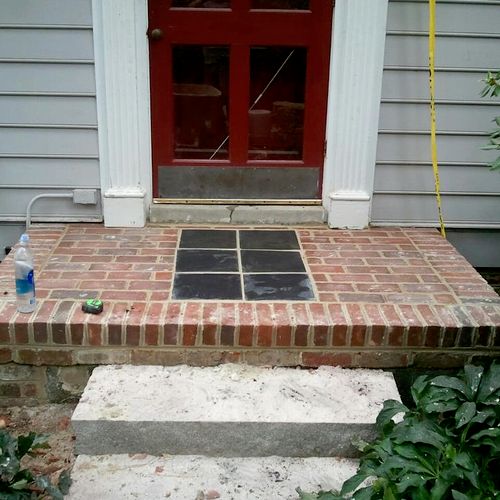 Brick stoop with slate insert (prior to clean-up).