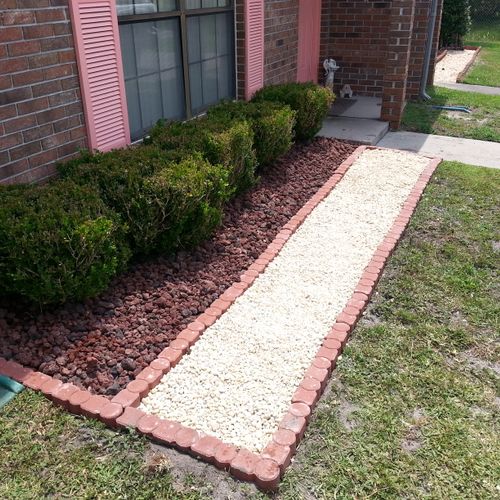 Flower bed edging and stone installation