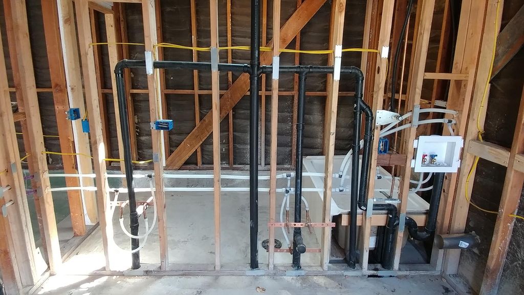Plumbing installed for bathroom for garage to apt 