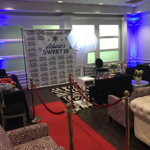 Photo booth with custom step & repeat backdrop and